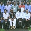 Dr Joe Tabe (dark glasses)  in Papua New Guinea